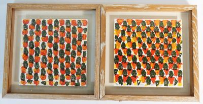 deux tableaux représentant des oranges et des feuilles vertes, dans un cadre en bois