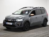 the grey suv is parked in a room with a checkered floor
