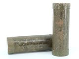 a small metal tube that is next to a smaller metal tube