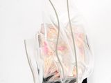 a clear bag with a bunch of items inside of it