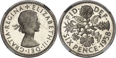 a silver coin with an image of a woman on it