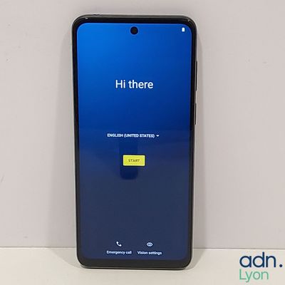 a close up of the back of a samsung galaxy s9 with a blue screen and a yellow button