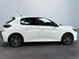 the white car is parked on the concrete floor in the room