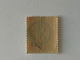 a small piece of paper that has a stamp on it
