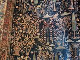 a carpet with a pattern on it on the floor