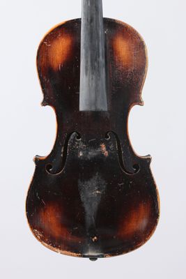 an old violin with a bow on a white background