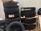 a lot of tires stacked on top of each other