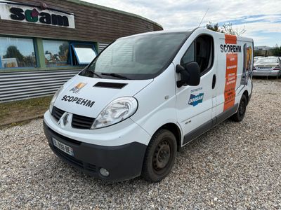 a white van that is parked in front of a building