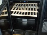 an image of a kitchen with a wine cooler in it