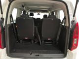 four seats in the back of a van with the door open