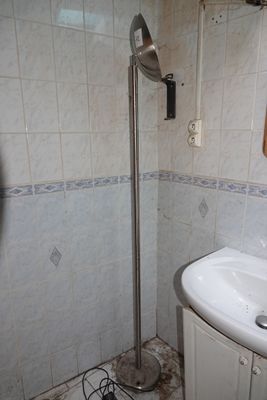 a bathroom with a sink and a shower in it