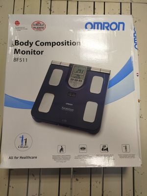 pèse personne de marque OMRON - Photo 1