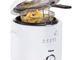 a close up of a fryer with a frying basket on top of it