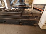 a machine that is working on a piece of metal