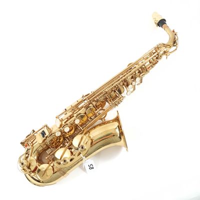 an image of a gold saxophone with a white background