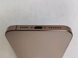 the back of an iphone 6s with a gold finish