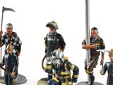 many figurines of different types of people on display