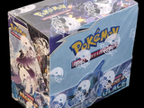 a box of pokemon trading cards on a black background