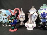 five vases that are sitting next to each other on a table