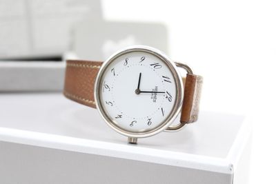 a watch that is sitting on top of a table