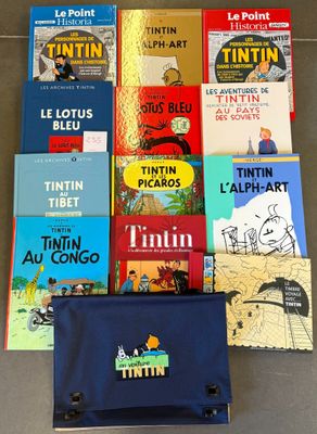 a lot of books that are sitting on the floor