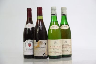 three bottles of wine are lined up on a table
