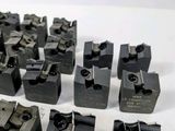 many pieces of metal that are sitting on a table