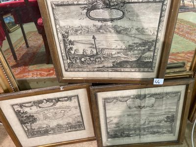 trois dessins encadrés représentant un paysage et un bateau sur un lac