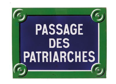 blue and white sign with green border saying passage des patriaches