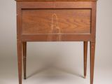 an image of a small wooden table with a drawer on it