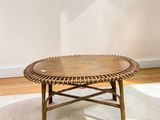 a coffee table that is on a rug in a room