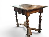 a wooden table with a glass top on a white background