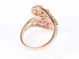 an image of a gold ring with multi colored stones