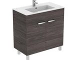 the bathroom vanity is made of wood and has a white counter top