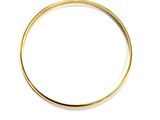 a close up of a gold ring on a white surface