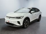 a white volkswagen suv parked in a showroom