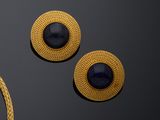 a pair of gold and lapis earrings and a necklace