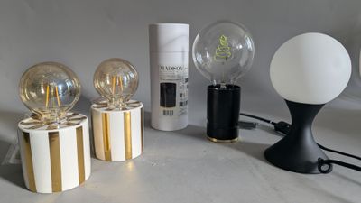 a lot of different types of light bulbs on the table