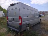 an image of a van parked in a lot