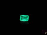 a green emerald in the dark