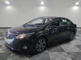 a picture of a black toyota corollant parked on a checkered floor