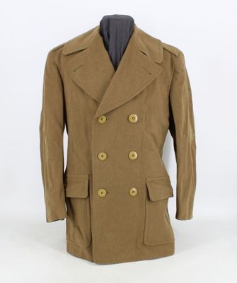 a brown peale coat on a mannequin mannequin mannequin mannequin mannequin mannequin mannequin mannequin mann