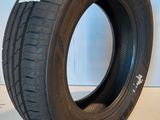 a close up of a tire on a white surface
