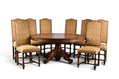 une image représentant une table à manger ronde entourée de six chaises