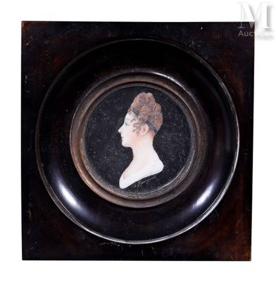 an old picture of a woman in a black dress in a black frame