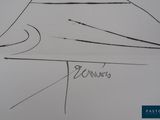 drawing of a sailboat on a white paper with the name of the boat