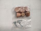 a package of wooden pegs and screws on a table