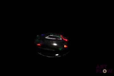 an image of a computer mouse lit up in the dark