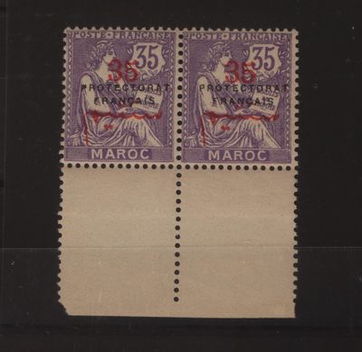quelques timbres sur un fond noir, représentant un homme et une femme