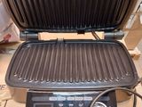 an image of an electric grill on a box